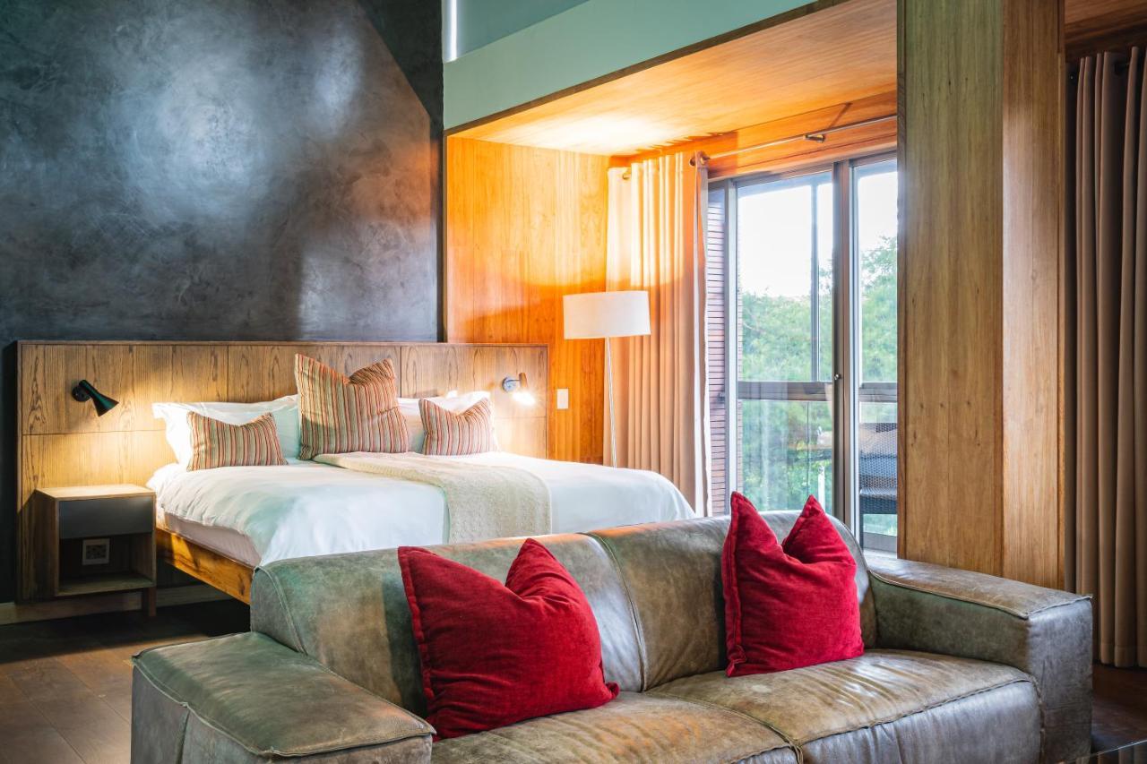 Menlyn Boutique Hotel Pretoria-Noord Exterior foto A bedroom at the hotel