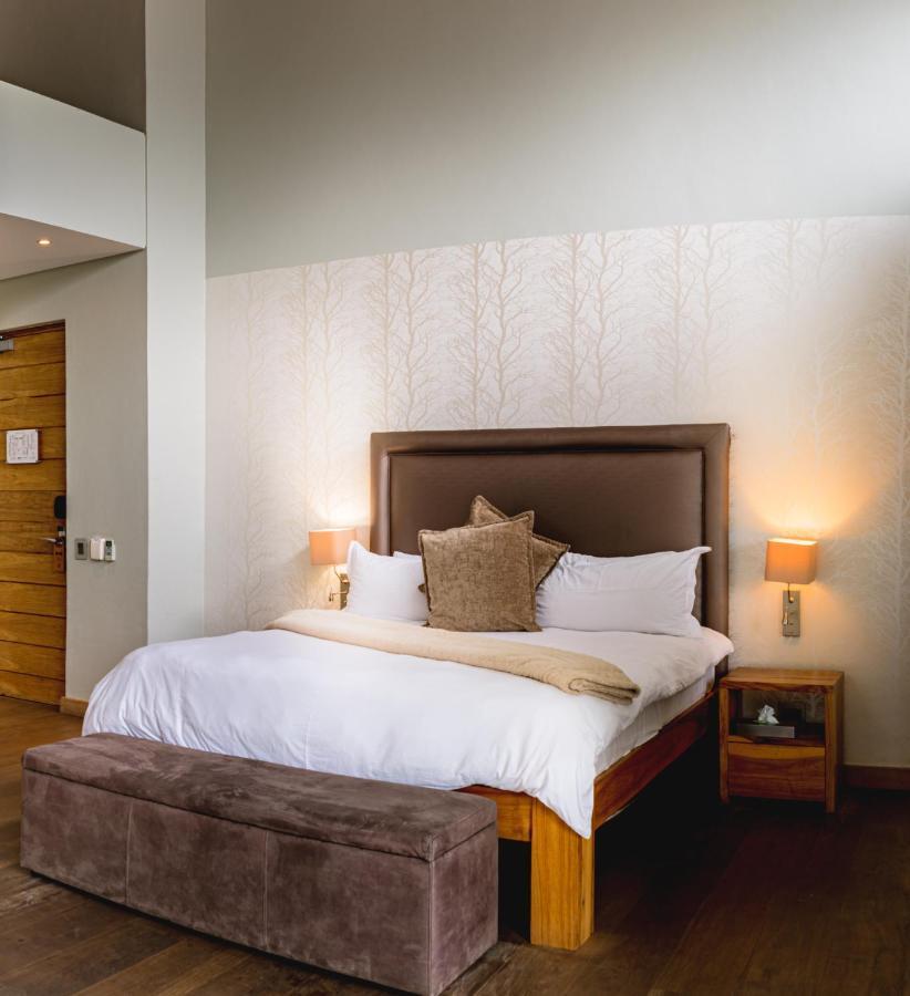 Menlyn Boutique Hotel Pretoria-Noord Exterior foto A bedroom at the Protea Hotel, Centurion