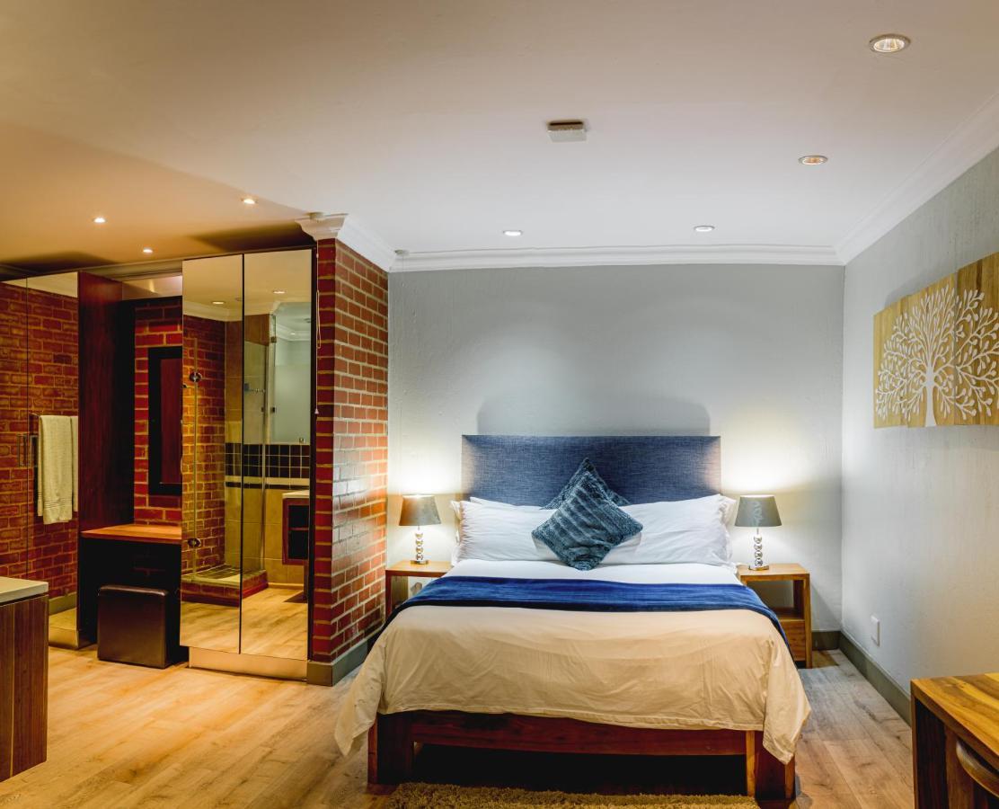 Menlyn Boutique Hotel Pretoria-Noord Exterior foto A room at the hotel