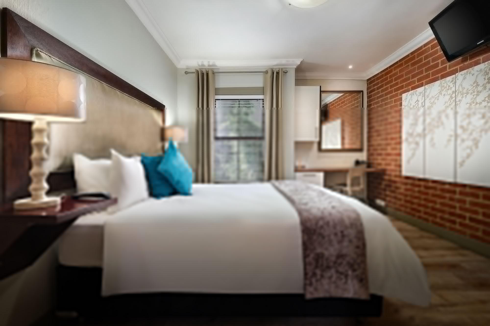 Menlyn Boutique Hotel Pretoria-Noord Exterior foto A bedroom at the hotel