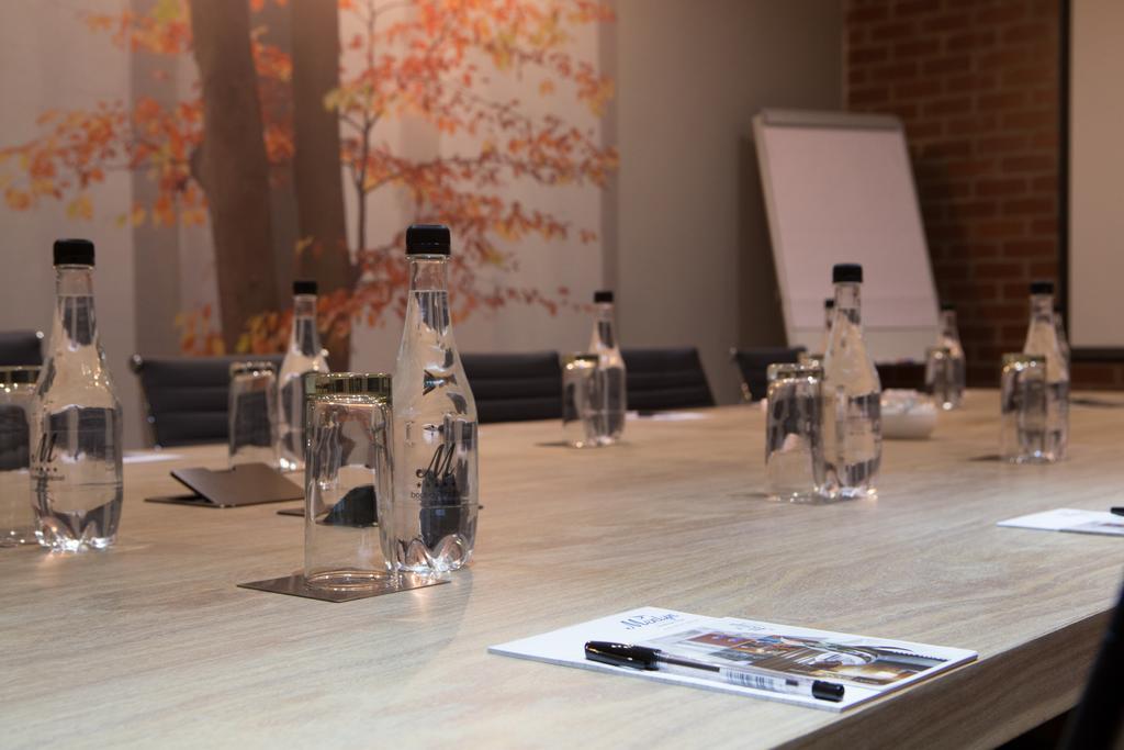 Menlyn Boutique Hotel Pretoria-Noord Exterior foto Bottled water on a conference table