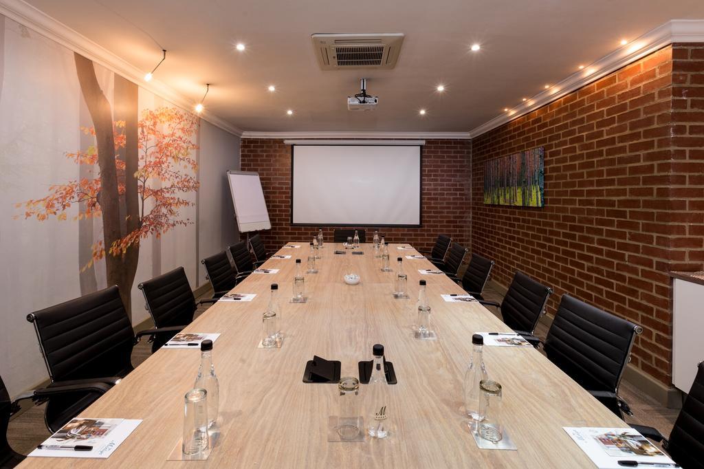 Menlyn Boutique Hotel Pretoria-Noord Exterior foto The Boardroom at the Old Bank Hotel